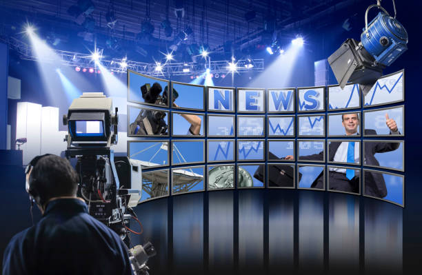 istock Video wall with TV Screens showing News in Studio broadcasting 960255418
