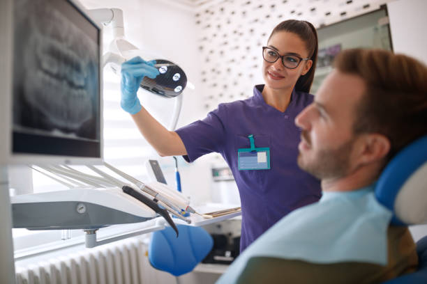 istock Dental doctor begins work with patient 960268174