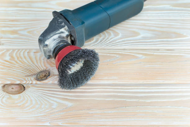 istock angle grinder with wood and wood brashing tool 960268428