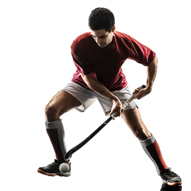 istock field hockey player man isolated silhouette white background 960268548