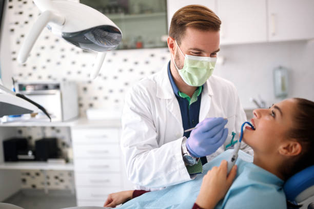istock Dentist checkup patient in dental chair 960268604