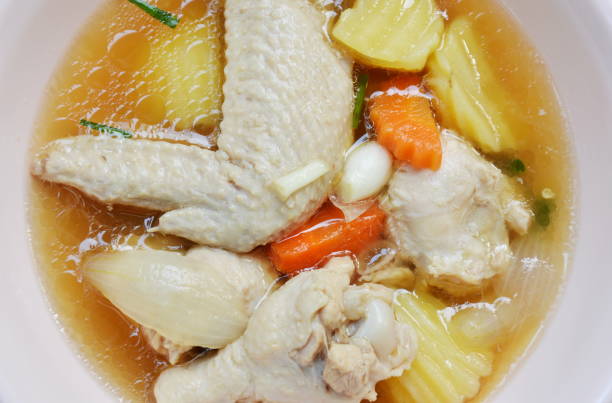 istock boiled chicken leg and wing with potato soup 960269066