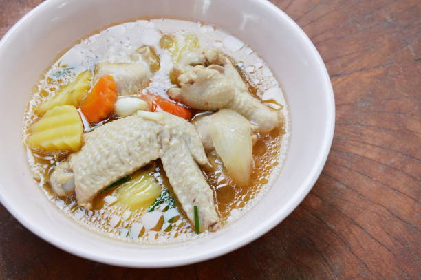 istock boiled chicken leg and wing with potato soup 960269068