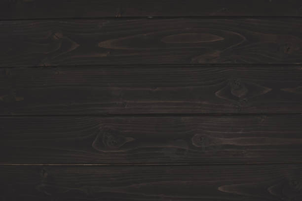 istock dark wooden background with copy space 960272274