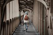 Cycling Over a Bridge to Work