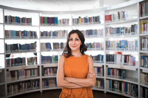 Portrait of a mixed race woman smiling in the school library in Kuala Lumpur, Malaysia