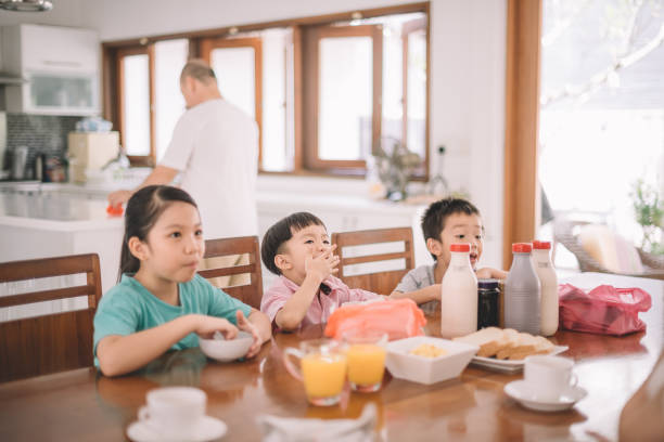 istock asian chinese family at dining room having breakfast 960285064