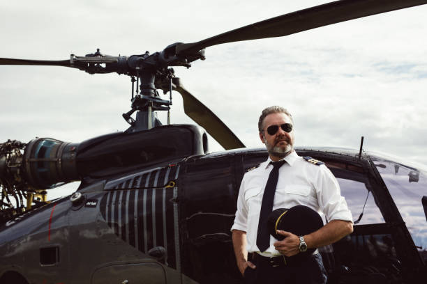 istock Helicopter pilot in sunglasses by helicopter 960287264