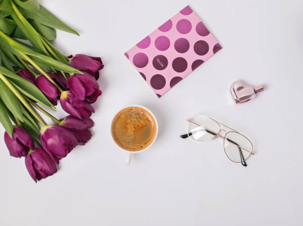 istock Coffee and beautiful purple tulips 960289616