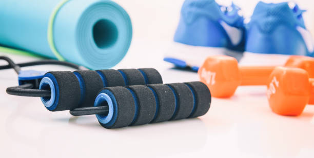 istock Expander and fitness equipment on white background 960289722