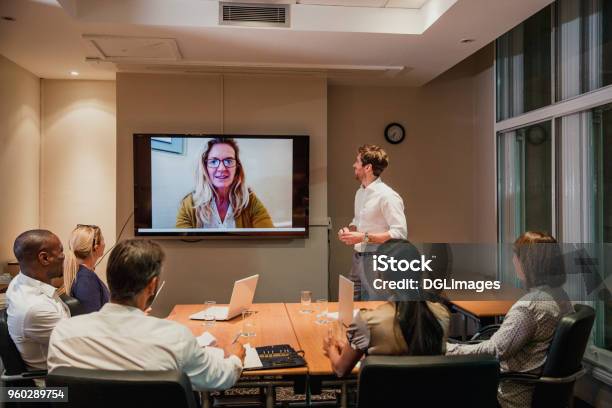 Late Night Video Conference Meeting Stock Photo - Download Image Now - Video Conference, Business Meeting, Computer Monitor