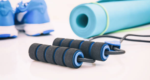 istock Expander and fitness equipment on white background 960289800