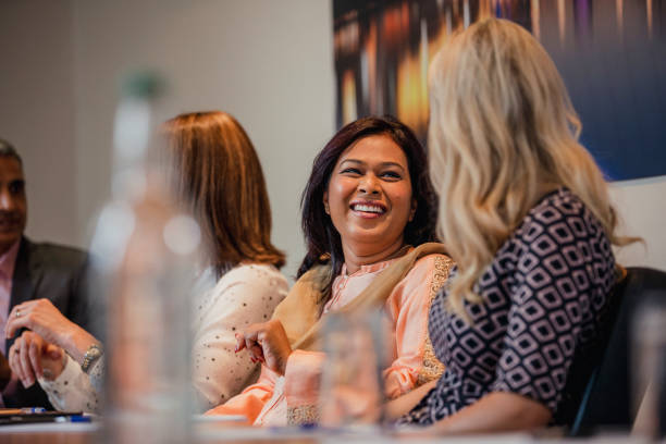 Businesswomen Talking Before a Meeting