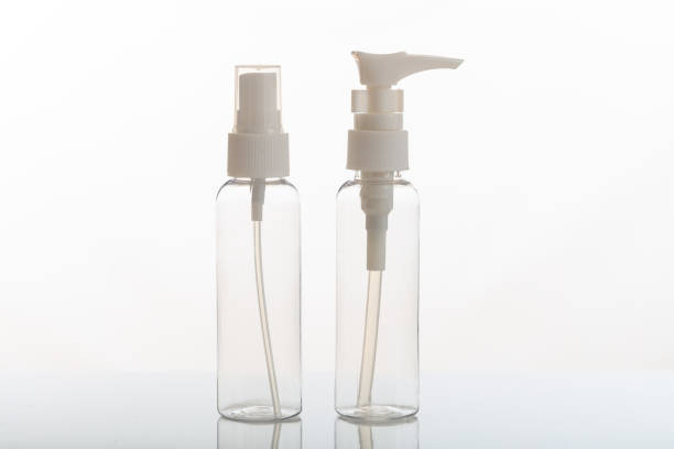 istock Empty transparent cosmetic bottles isolated on white background 960294646