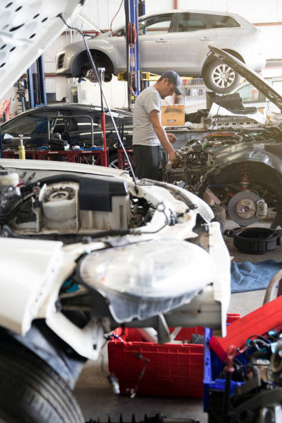 istock Auto Repair Garage with Mechanic 960294994