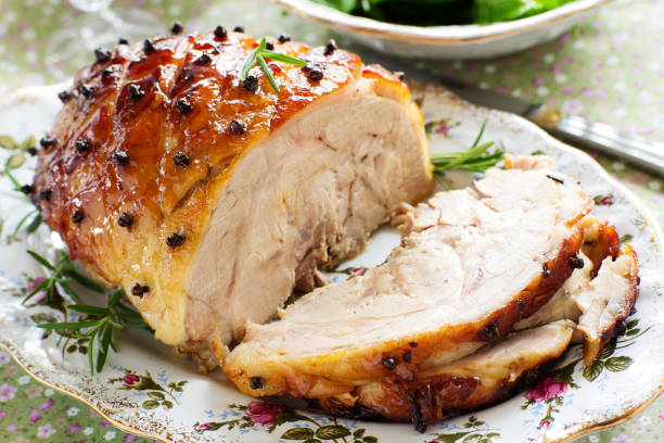 istock Roast pork with orange glaze, decorated with cloves. 960301592