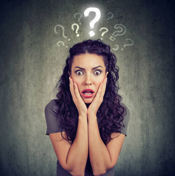 istock Shocked scared woman looking at camera has many questions 960302018