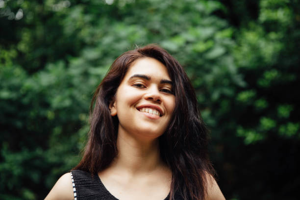 istock Happy woman in forest 960305614