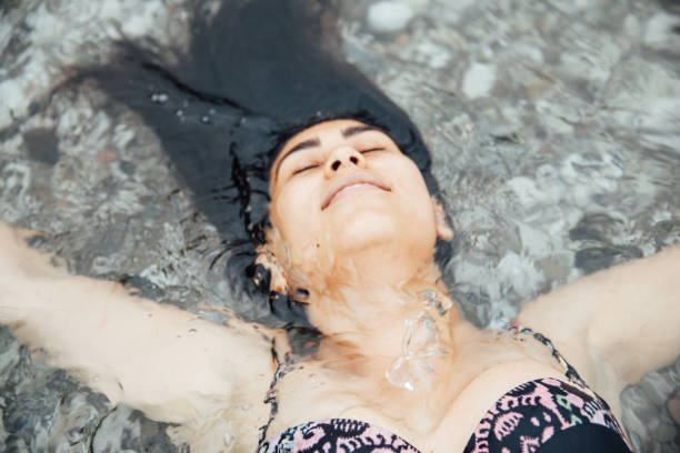 istock Serene Woman Swimming Olympus 960305718