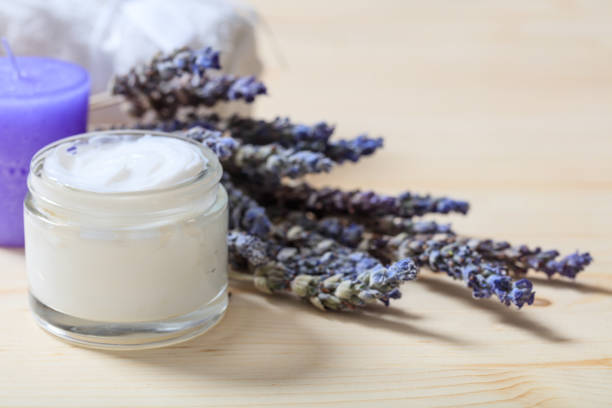 istock Moisturizing cream and lavender on wooden background 960305850