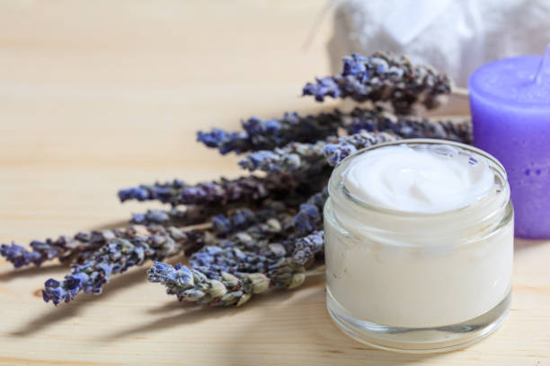 istock Moisturizing cream and lavender on wooden background 960305878