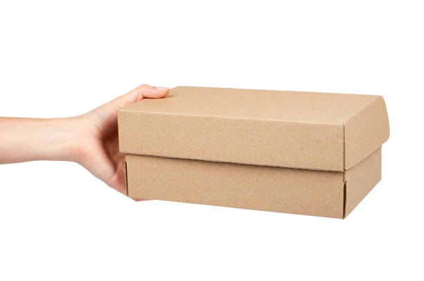 istock Brown cardboard box for packaging and delivery, isolated on white background 960307906