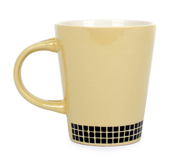 istock Porcalain brown tea cup isolated on white background 960307968