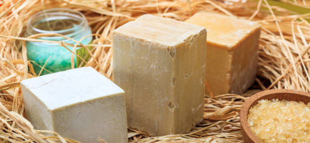 istock Natural handmade soap bars on straw background 960311170