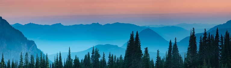 Blue hour after sunset over the Cascade mountains in Mount Rainier National Park, Washington.