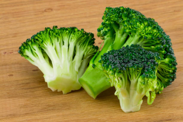 istock Fresh broccoli on the cutting wooden board 960316542