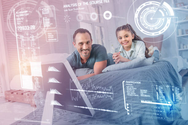 istock Happy man relaxing at home with his cute daughter and looking glad 960317070
