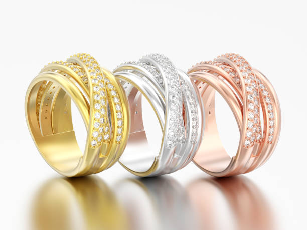 istock 3D illustration three different gold decorative diamond criss cross rings 960317558
