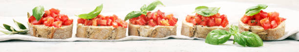 istock fresh tomato bruschetta. italian food appetizer with basil 960326082