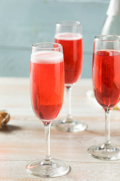 Sweet homemade Rose Mimosas Sweet homemade Rose Mimosas with Berry Syrup rose champagne stock pictures, royalty-free photos & images