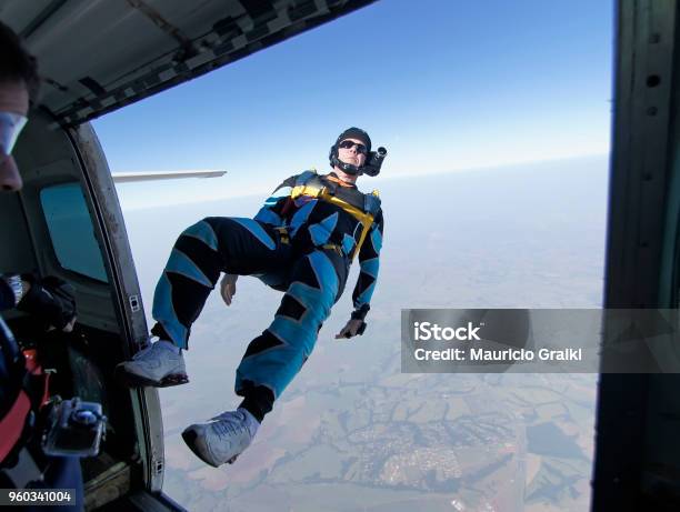 Paratrooper Jum From The Airplane Stock Photo - Download Image Now - Airplane, Skydiving, Jumping