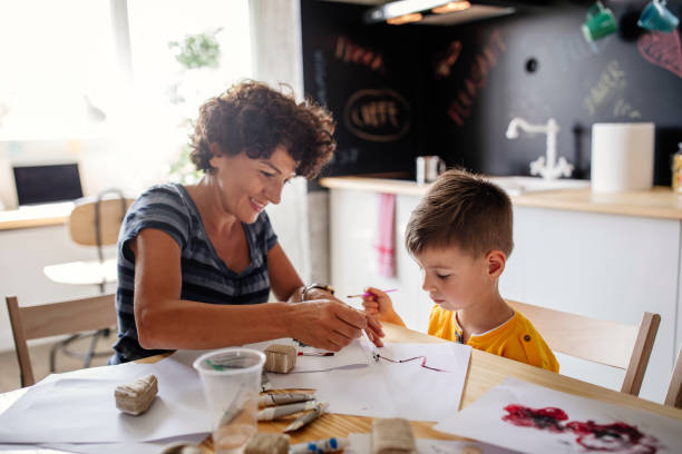 istock Mother with her little artist 960341928