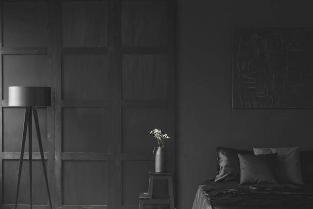 istock White flowers in black bedroom 960348630