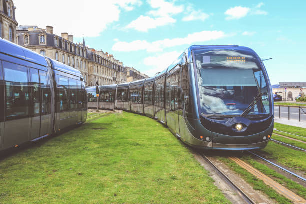 Tram in the center of Bordeaux in France. The Bordeaux tramway network is notable for using a ground-level power supply of the Alimentation par Sol (APS) system.