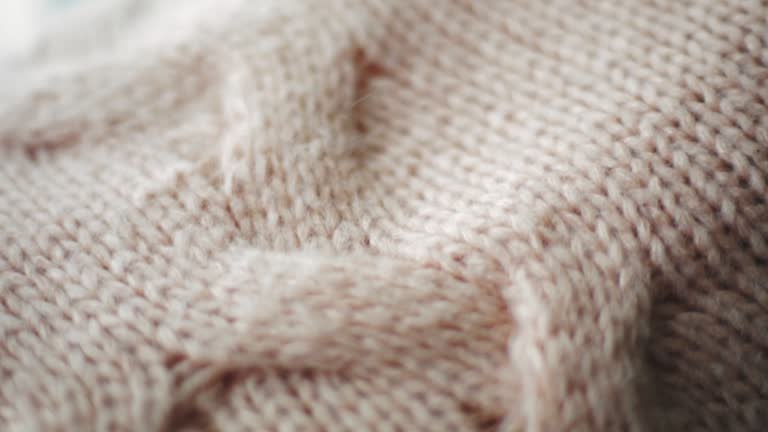 Dolly shot of knitted winter sweater