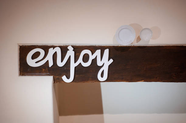 istock Letters enjoy at the wall 960353646