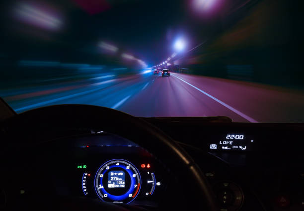 car moving on highway at night - car dashboard night driving imagens e fotografias de stock