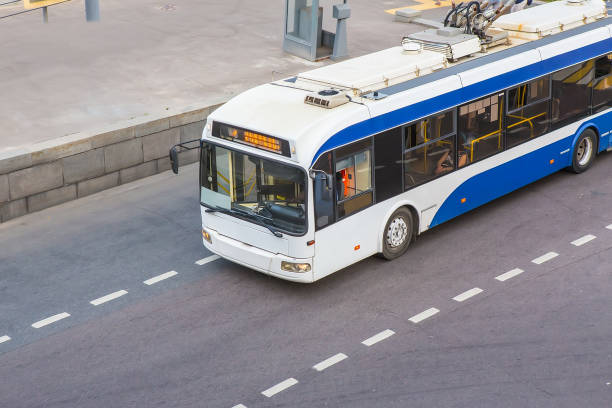 trolley moves along a city street