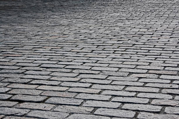 istock Roadway made of natural stone texture 960371500