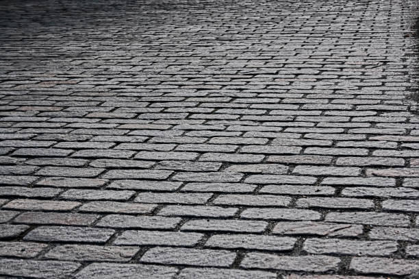 istock Roadway made of natural stone texture 960371504