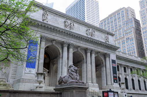 New York, USA - May 7, 2018 : New York Public Library is an emblematic building located in the East of Bryant Park in Manhattan (NYC).