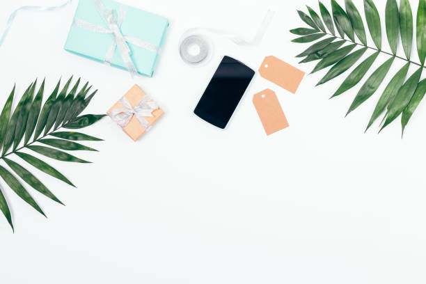 istock Summer arrangement with palm branches, gifts, ribbons 960377682