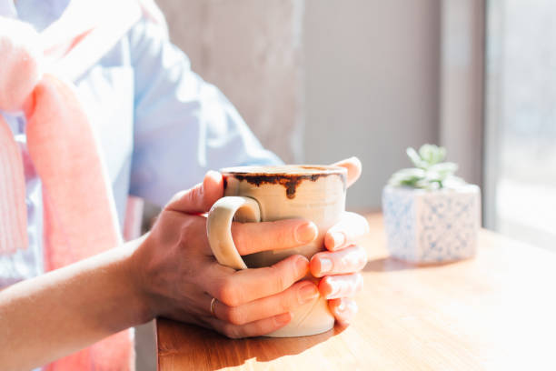 istock Woman drinking coffee in a cafe 960382722