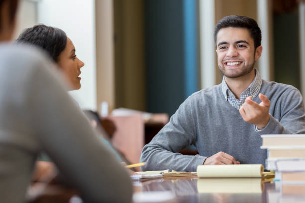 istock Businessman gestures during meeting with colleagues 960388572