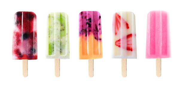 Mixed fruit popsicles isolated on white Assortment of fruit popsicles isolated on a white background flavored ice photos stock pictures, royalty-free photos & images