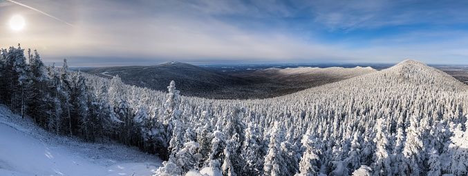 End of a cold winter afternoon over Megantic mountains range after the snowstorm, Quebec, Canada
